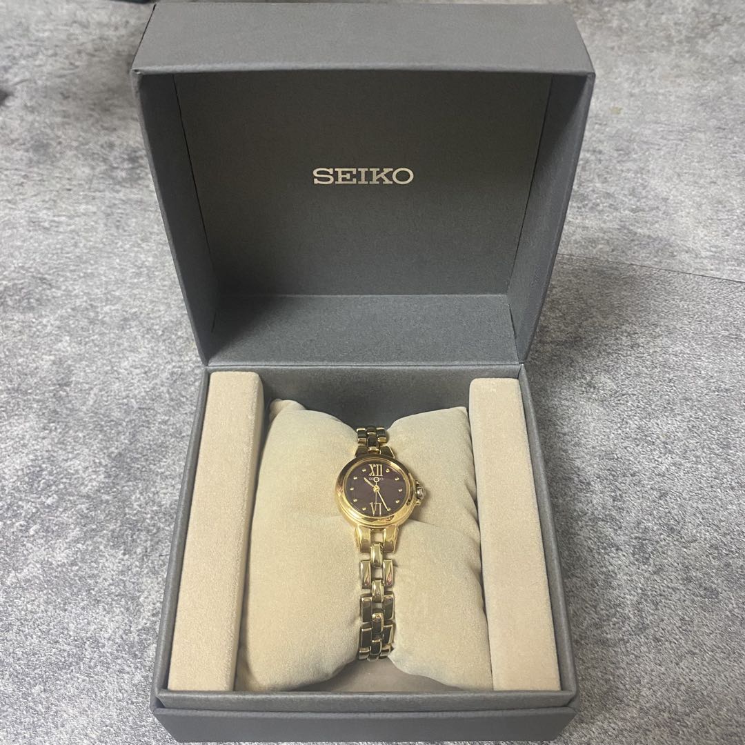 Seiko V111-0AG0 Analog Quartz Women