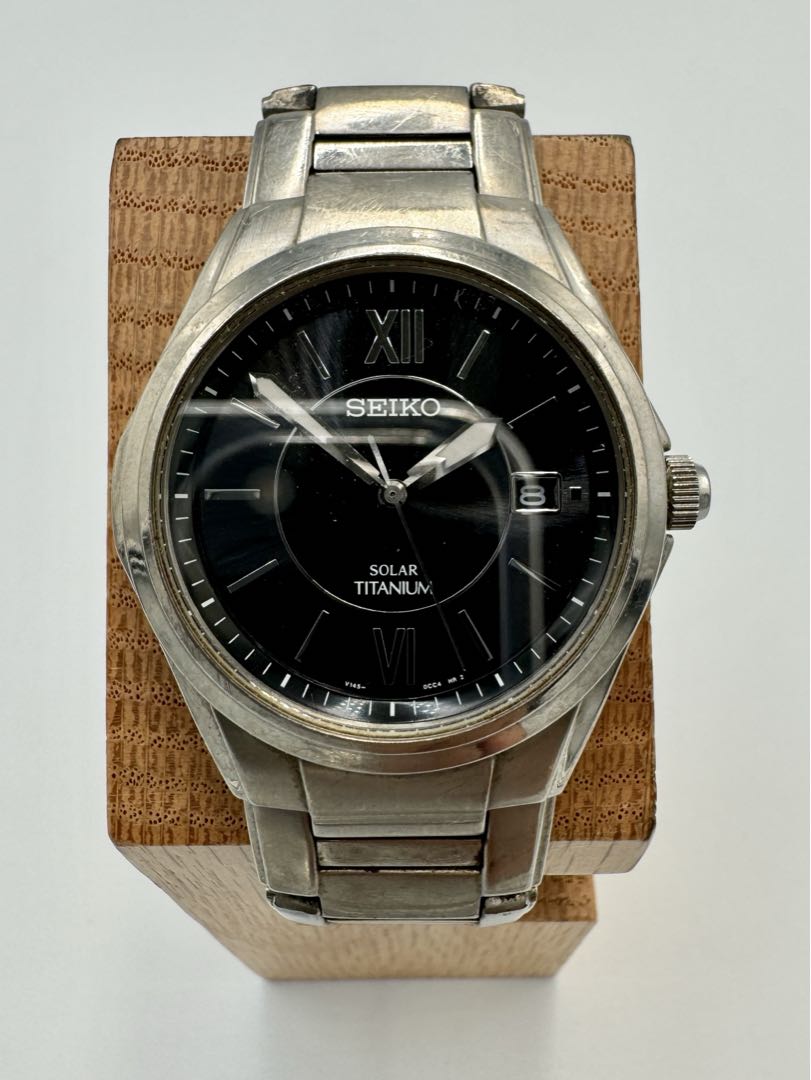 Seiko Spirit V145-0BA0 Analog Quartz Unisex Adults Solar Titanium Vintage Day Date Black Dial Men'S Watch Japan