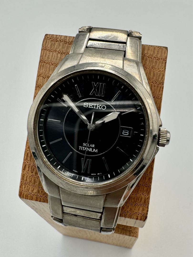 Seiko Spirit V145-0BA0 Analog Quartz Unisex Adults Solar Titanium Vintage Day Date Black Dial Men'S Watch Japan