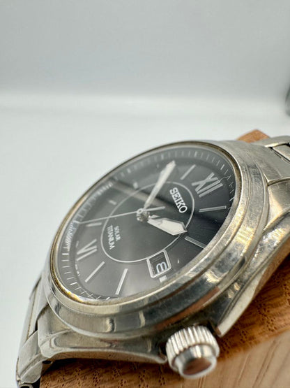 Seiko Spirit V145-0BA0 Analog Quartz Unisex Adults Solar Titanium Vintage Day Date Black Dial Men'S Watch Japan