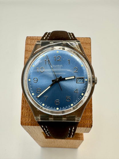 Swatch Analog Quartz Unisex Adults Wristwatch, 34Mm Case, Blue Dial, Leather Strap