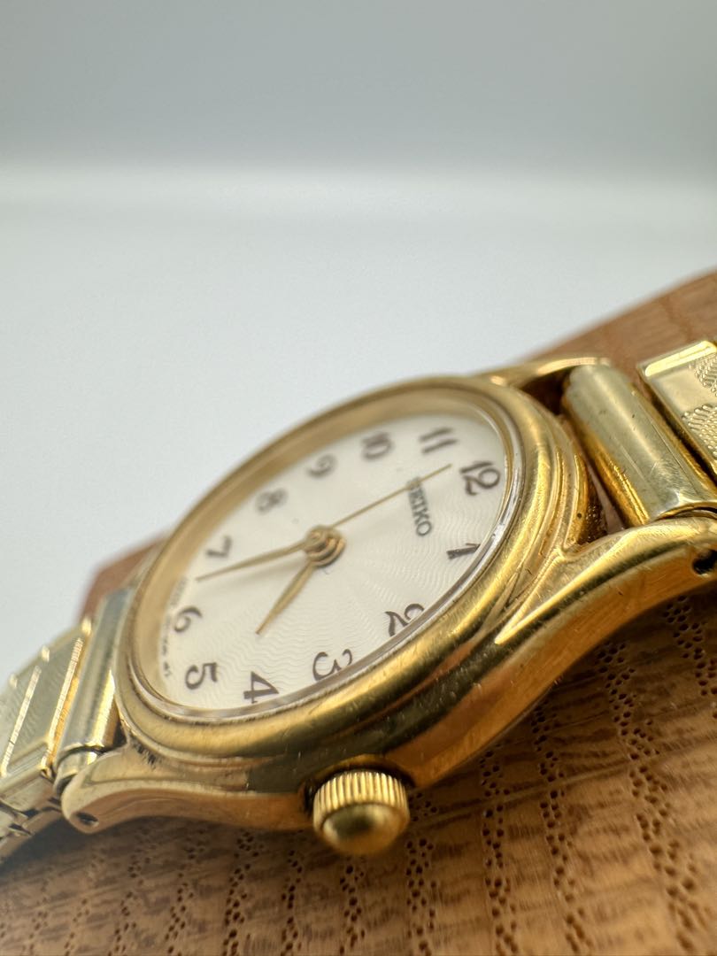 Seiko Essentials 1N01-0AW0 Analog Quartz Women Vintage Gold Plated White Oval Dial Ladies Watch Head Japan
