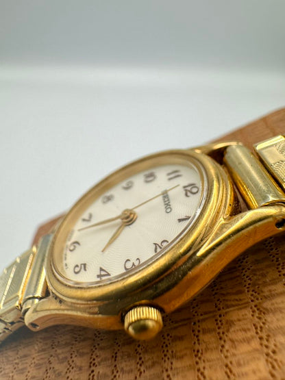 Seiko Essentials 1N01-0AW0 Analog Quartz Women Vintage Gold Plated White Oval Dial Ladies Watch Head Japan