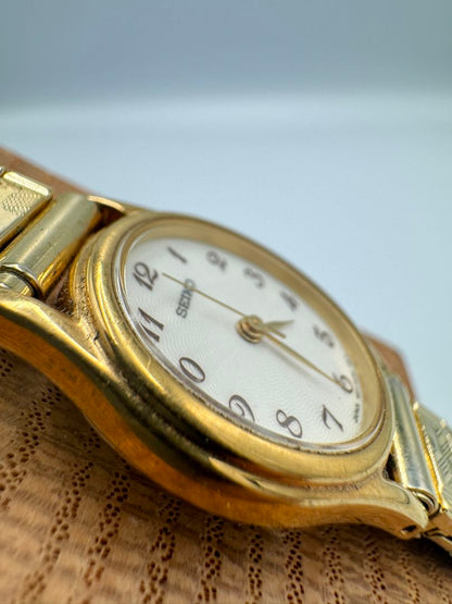 Seiko Essentials 1N01-0AW0 Analog Quartz Women Vintage Gold Plated White Oval Dial Ladies Watch Head Japan